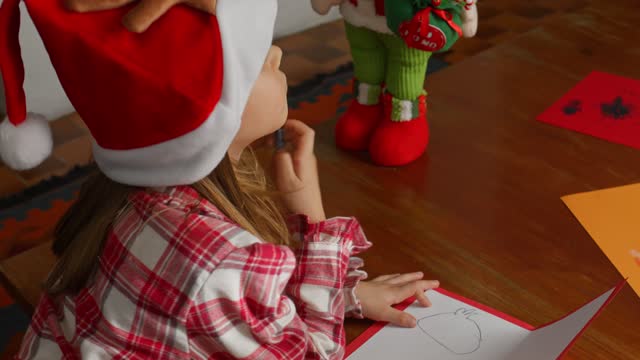 Two Kids Sharing a Christmas Moment.