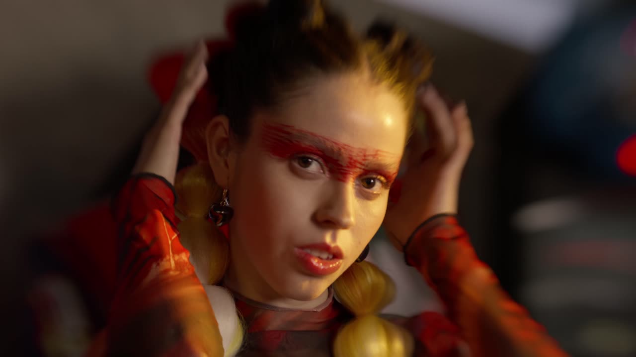 Portrait of a model at an arcade video games setting - Free Stock Video