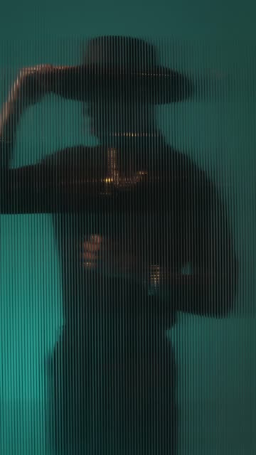 Western Male Fashion in Emerald Background.