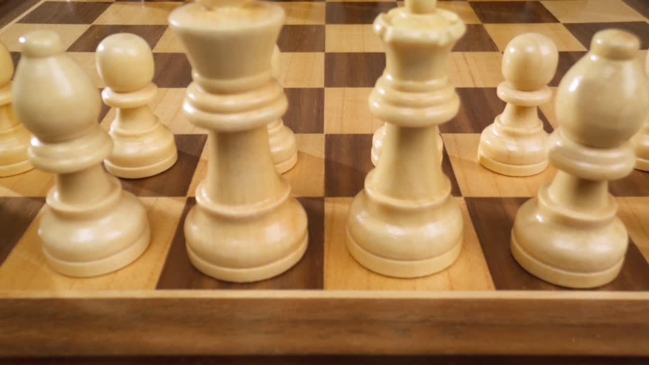 Close up shot of the chess board pieces neatly arranged ready for the ...