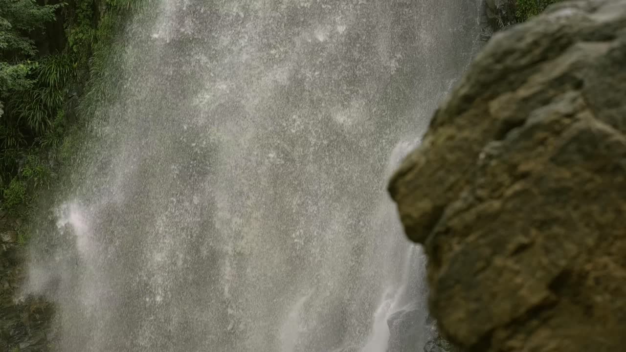 Cascading Waterfall and Rock Face - Free Stock Video