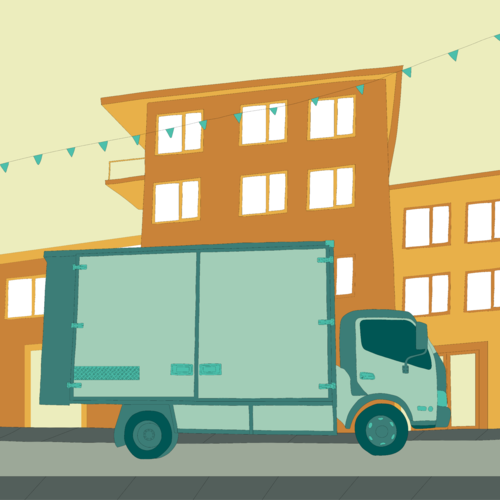 Removal truck parked in front of an apartment block
