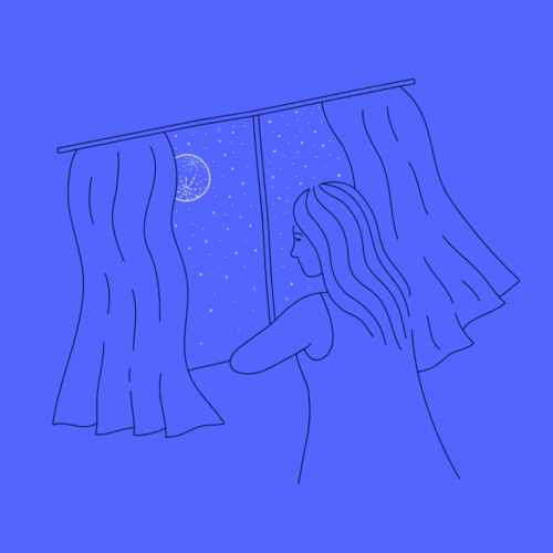 Woman staring out the window, looking at the night sky