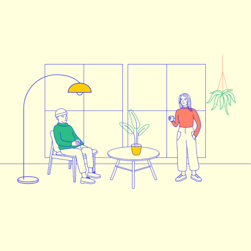 Two co-workers having a drink in an office breakout room