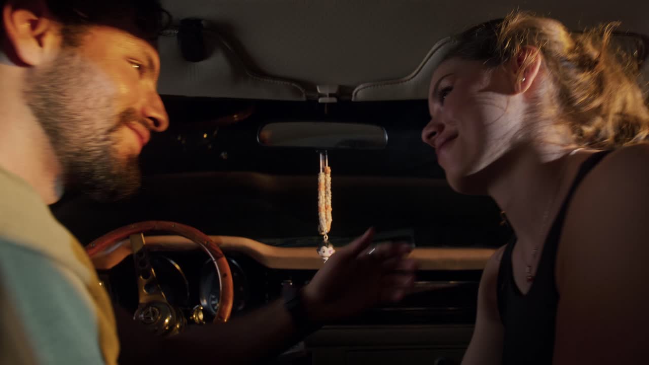 Kiss Seen from the Back Seat.