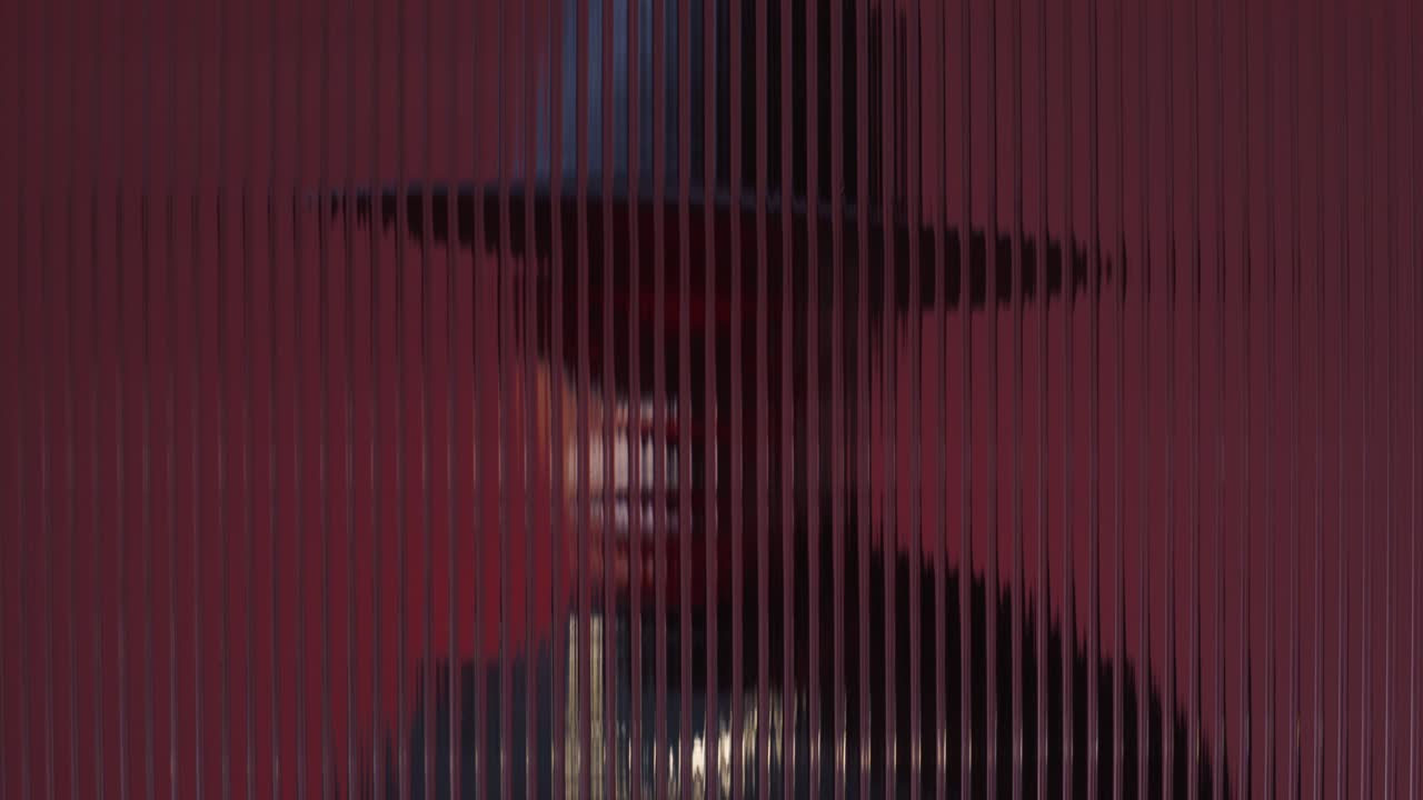 Model in Western Fashion Seen Through Acrylic.