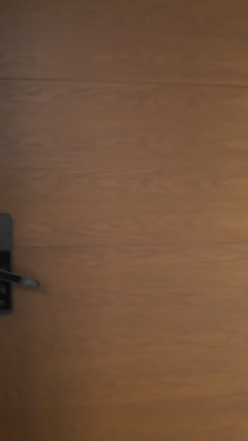 Couple Arriving at Hotel Room.