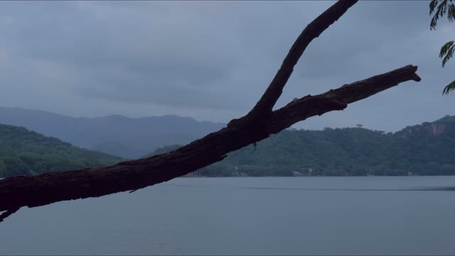 Timelapse Over Lake and Hills.