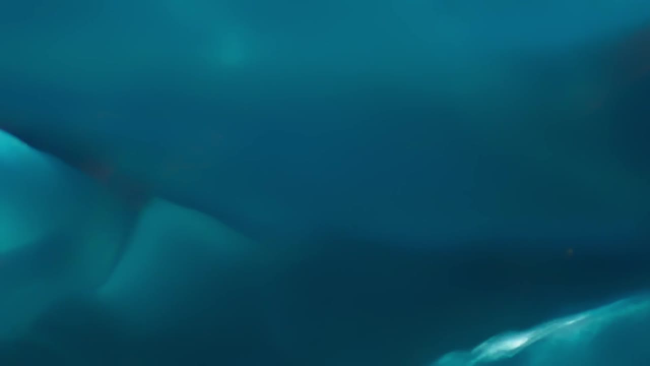 Abstract Blue Waves and Light Reflection - Free Stock Video