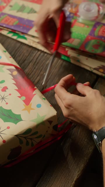 Hands Trimming Gift Ribbon.
