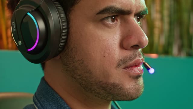 Extreme Close-Up of Man with Headset.