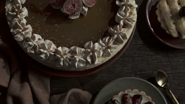 Pan Shot of Rustic Autumn Dessert Table.