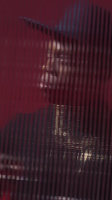 Black Model Giving Side Bow.