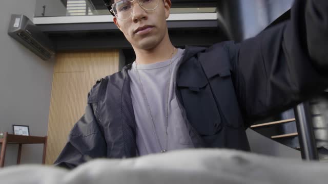 POV of Man Unpacking.