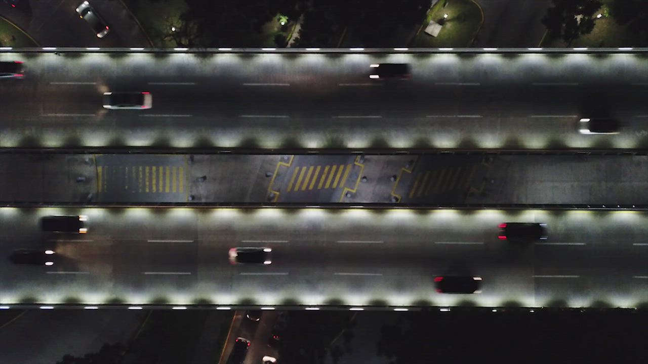 Traffic on a bridge at night - Free Stock Video