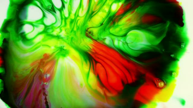 Liquid with psychedelic texture in multicolored tones.