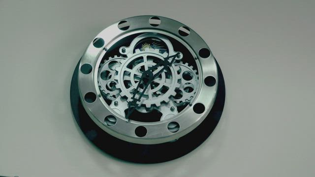 Wall clock with visible nuts.