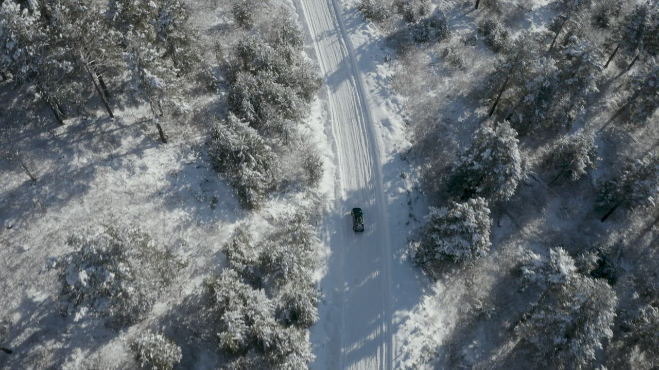 Vehicle driving in a winter road - Free Stock Video