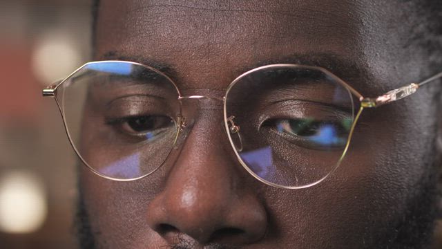 Film reflected on a pair of glasses.