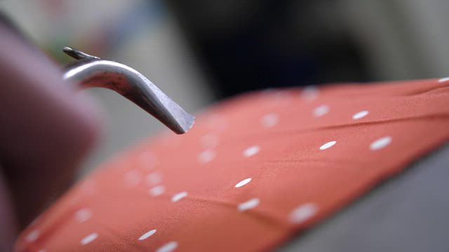 Using a steam cleaner to remove dirt.