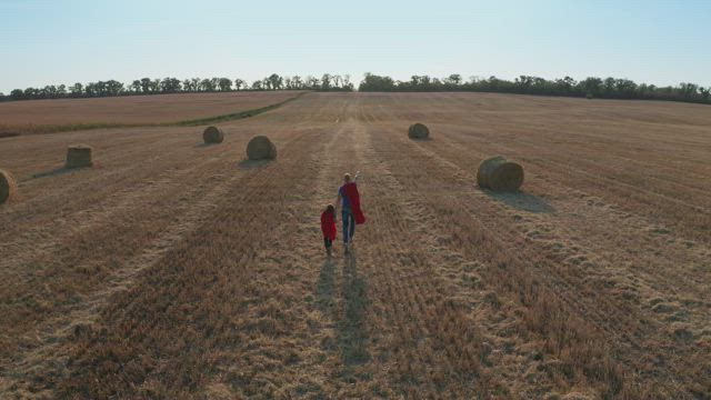 Running through a harvested field.