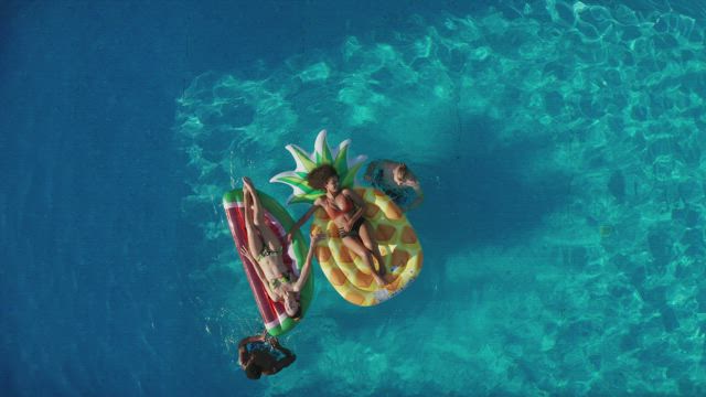 Spinning in a swimming pool.