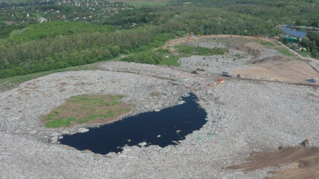 Polluted lake near a garbage landfill.