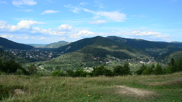 Houses between mountains.