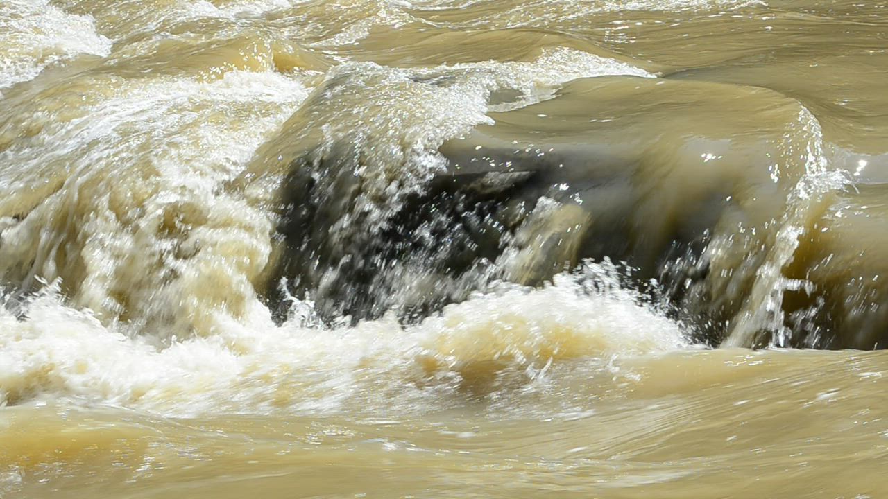 River water filled with mud - Free Stock Video