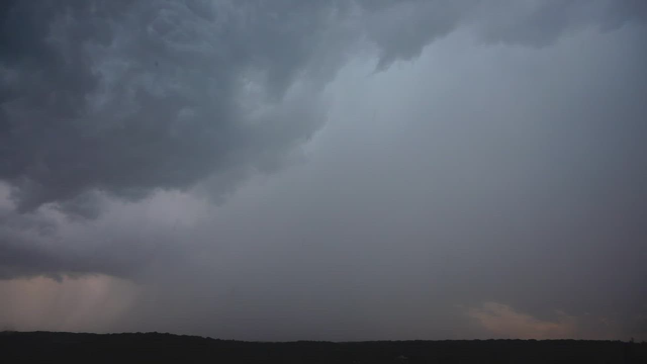 Lightning breaking through the clouds - Free Stock Video