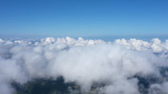 Clouds forming over land.