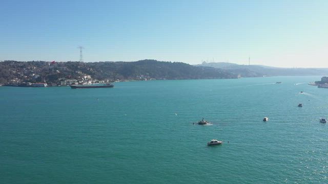 Boats anchored away from the shore.
