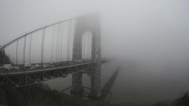 Deep fog on the Washington Bridge.