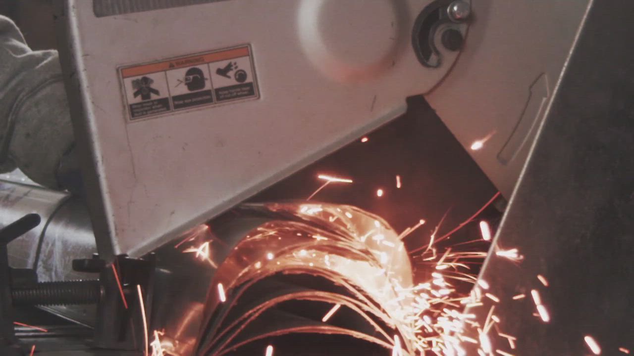 Sparks from a metal saw - Free Stock Video