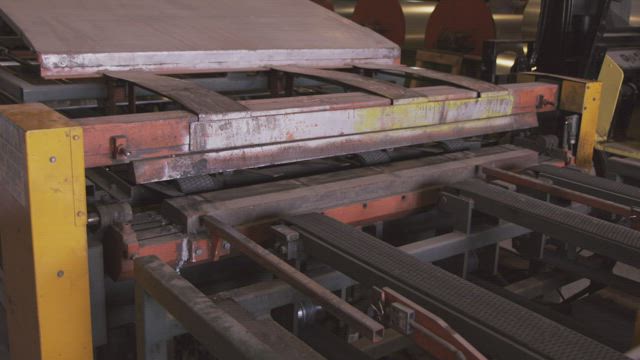 Metal pressing machine.