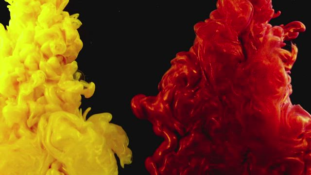 Bright red and yellow liquid forms.