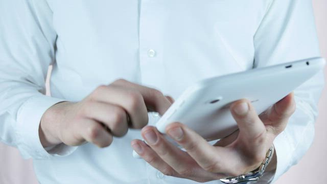 Man using tablet.
