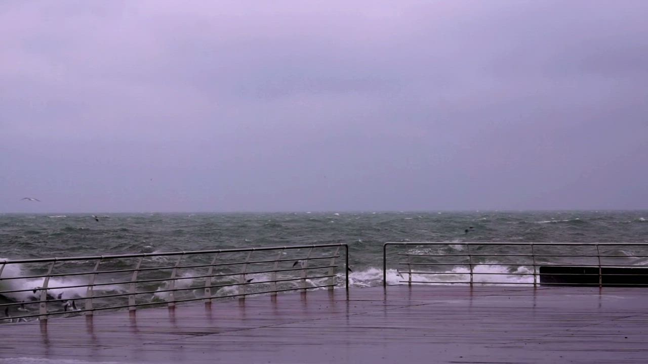 Waves crashing in the coast during a storm - Free Stock Video