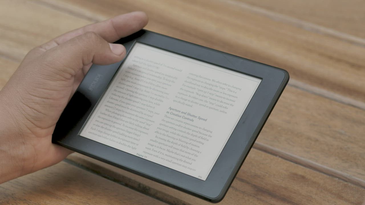 A person reading an ebook while drinks coffee - Free Stock Video