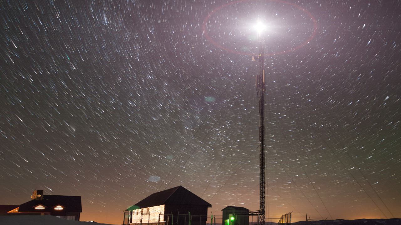Time-lapse of the moving stars and a tower - Free Stock Video