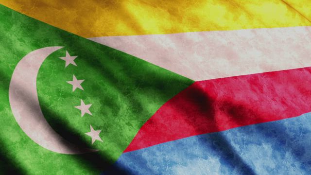 Comoros Flag waving, close up.