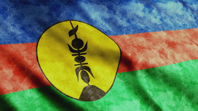 New Caledonia flag waving.