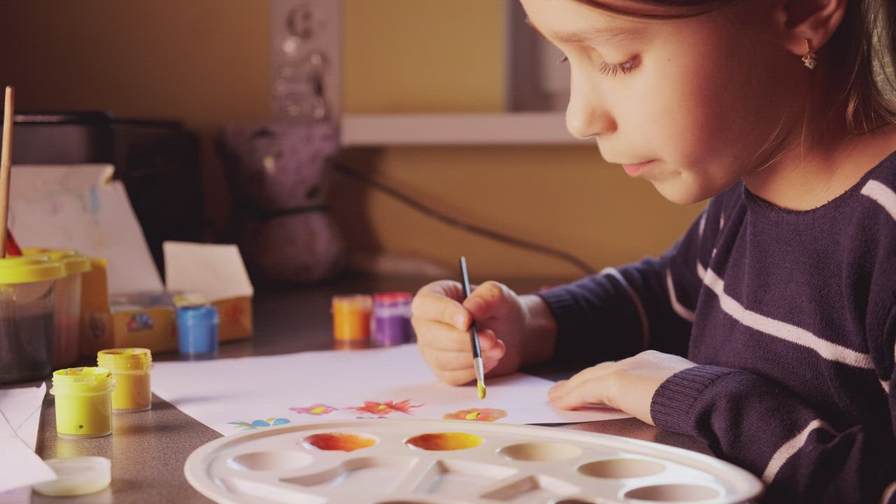 Girl painting with watercolors at home - Free Stock Video