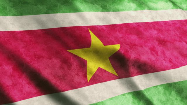 Suriname flag while waving, full screen.