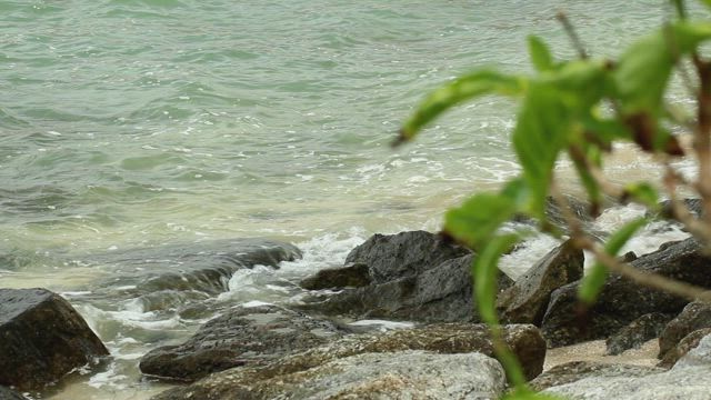 Ocean waters breaking on rocks.