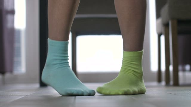 Dancing in bright socks.