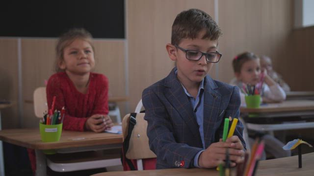 Kids focusing in class.