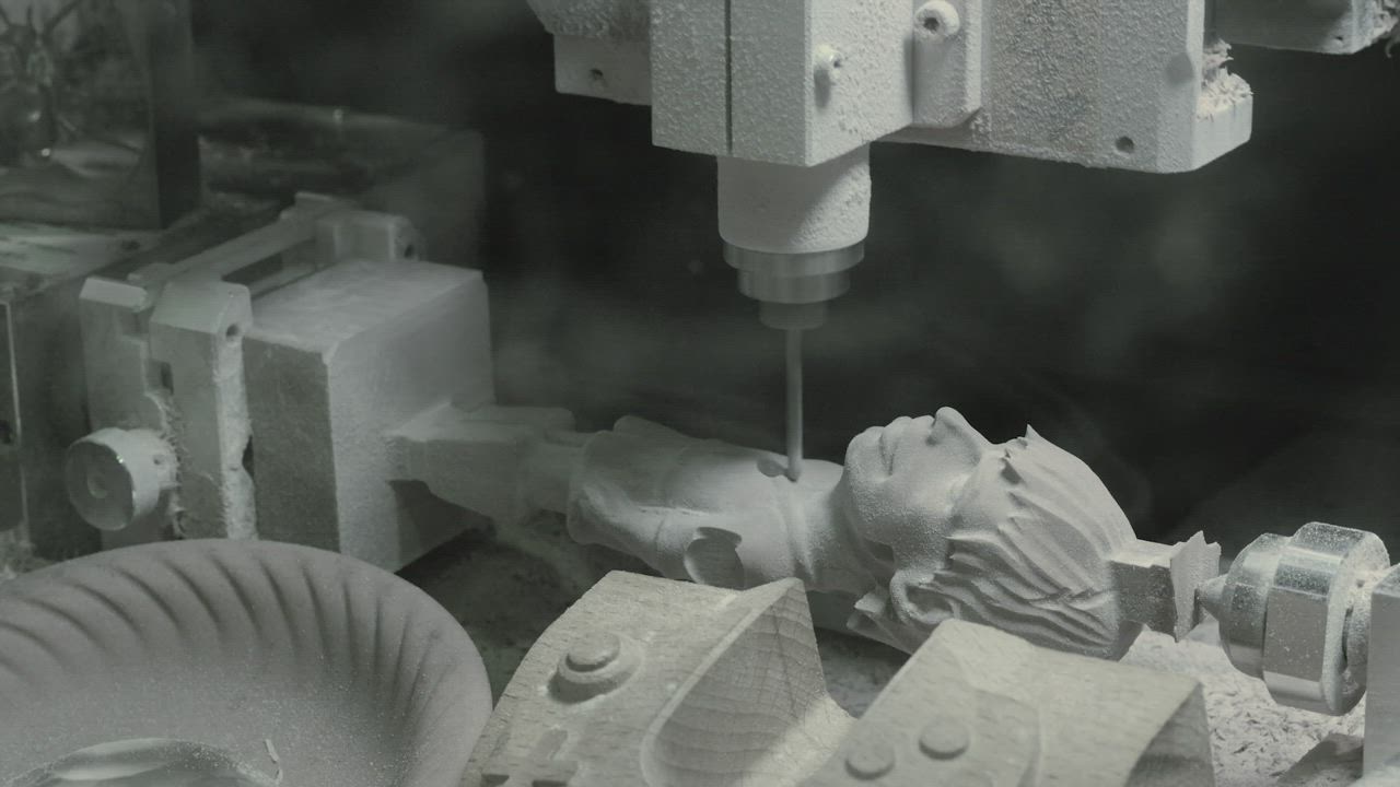 Milling machine creating a statue - Free Stock Video