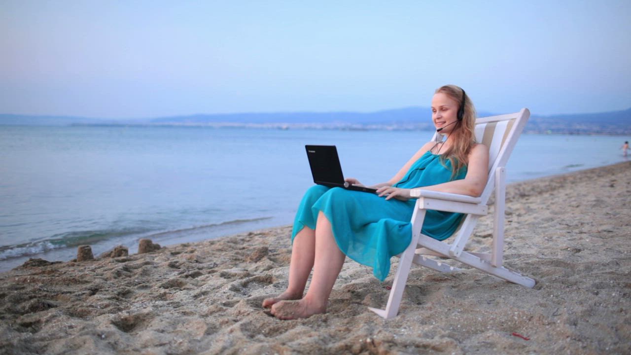 Evening video call at the beach - Free Stock Video