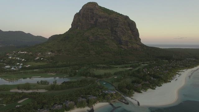 Tiny village in the shadow of a mountain.